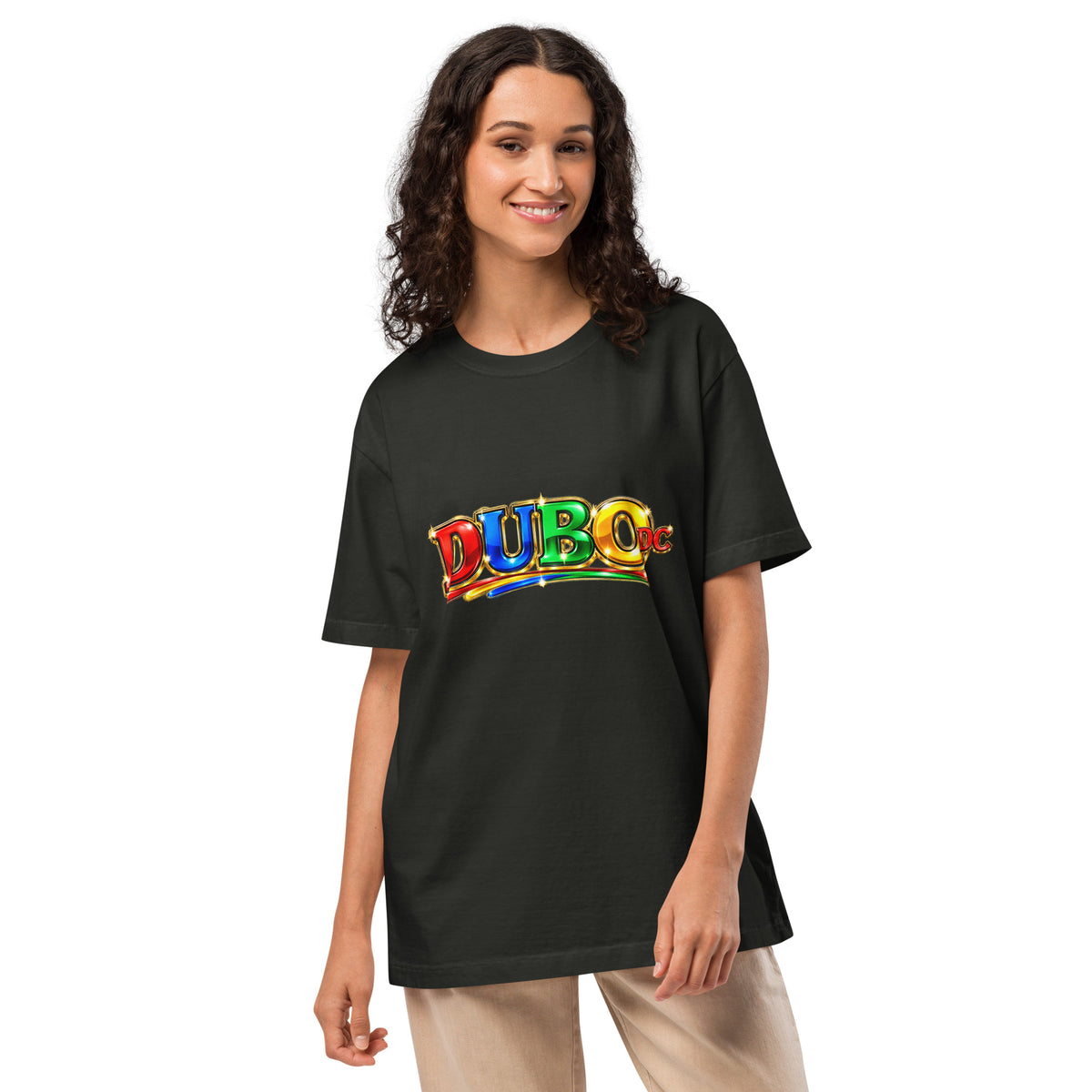 Wide colorful DUBO DC washed black oversized tee on a female model. Printful product mockup.